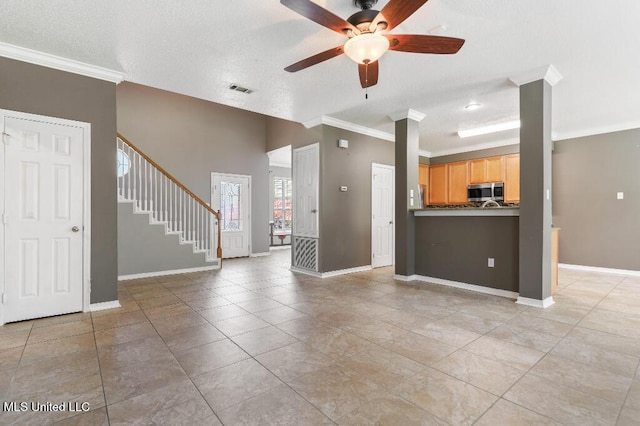 1585 Knoll Ct, Biloxi, MS 39532 - unfurnished living room featuring crown molding, ceiling fan, baseboards, stairway, and light tile patterned floors