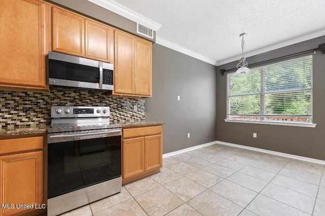 1585 Knoll Ct, Biloxi, MS 39532 - kitchen featuring appliances with stainless steel finishes, tasteful backsplash, ornamental molding, a textured ceiling, and light tile patterned flooring
