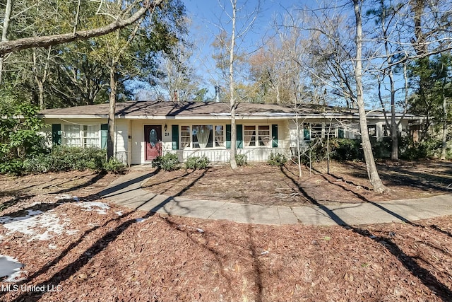 ranch-style house featuring a porch