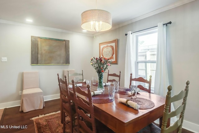 dining room featuring a notable chandelier, recessed lighting, wood finished floors, baseboards, and crown molding