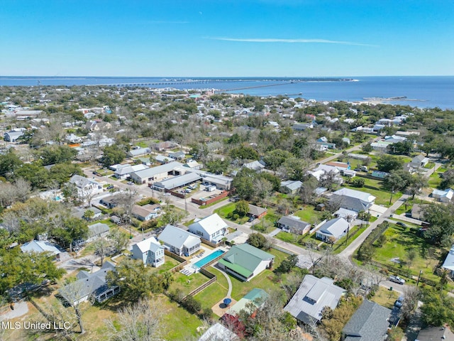 bird's eye view featuring a water view and a residential view