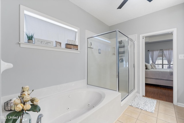 bathroom featuring plus walk in shower, tile patterned floors, and ceiling fan