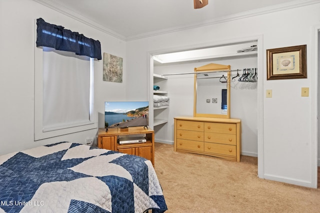 bedroom with a ceiling fan, light carpet, crown molding, and baseboards