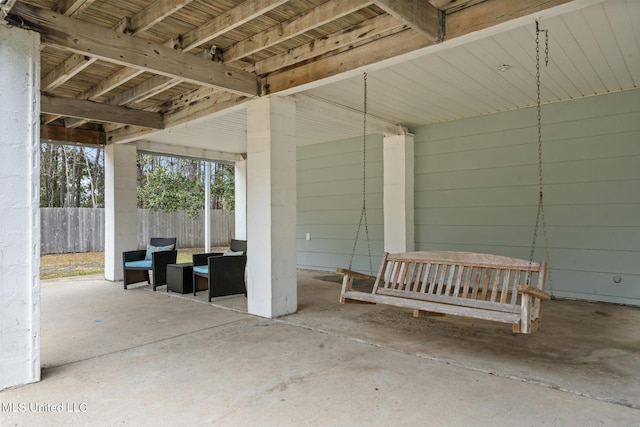 view of patio with fence