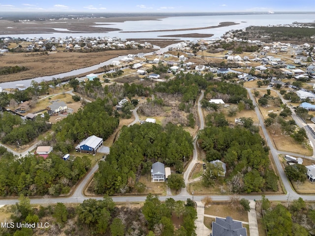 bird's eye view with a water view and a residential view