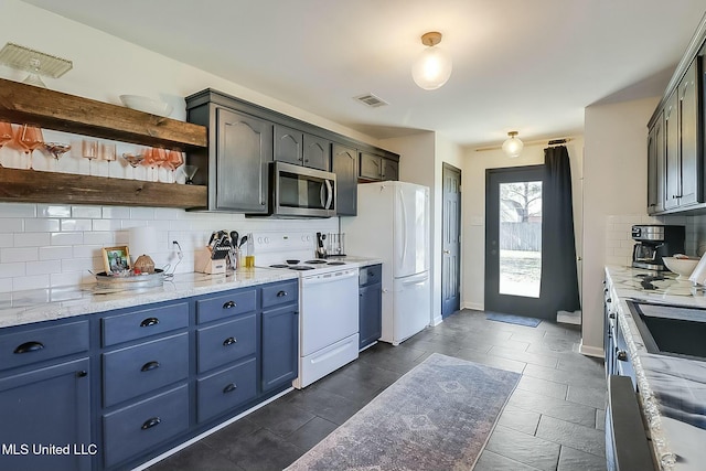 kitchen featuring white appliances, baseboards, decorative backsplash, blue cabinets, and open shelves