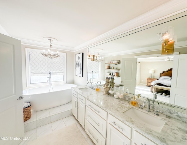 122 Breakers Ln, Ridgeland, MS 39157 - bathroom featuring a sink, an inviting chandelier, and a soaking tub
