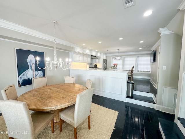 122 Breakers Ln, Ridgeland, MS 39157 - dining space featuring visible vents, recessed lighting, a chandelier, crown molding, and dark wood-style floors