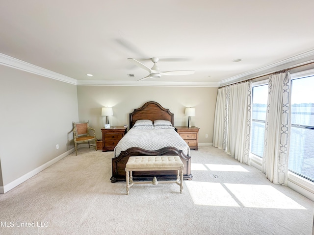 122 Breakers Ln, Ridgeland, MS 39157 - bedroom with multiple windows, light carpet, access to exterior, and ornamental molding