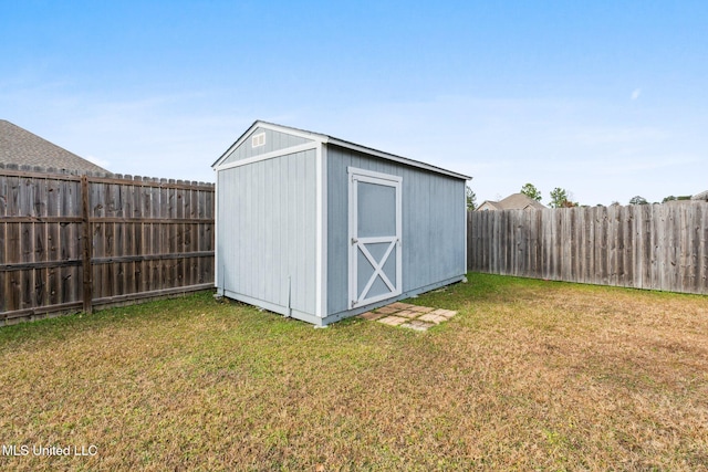 view of outdoor structure with a lawn