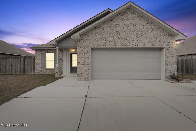 view of front of home with a garage