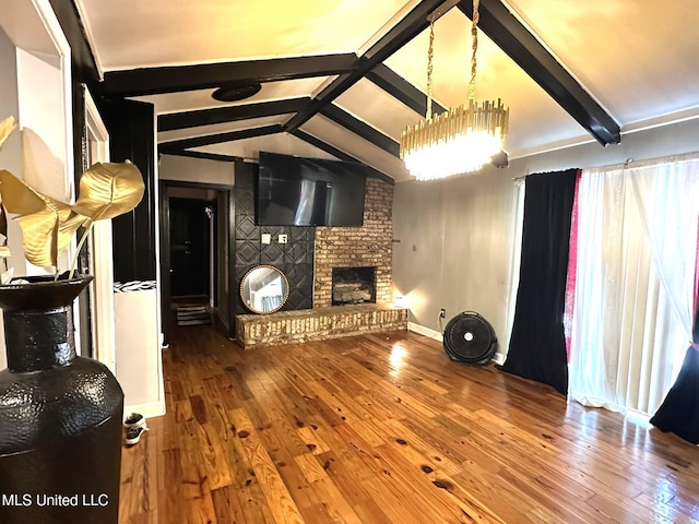 1052 Briarfield Rd, Jackson, MS 39211 - unfurnished living room featuring hardwood / wood-style floors, a fireplace, and baseboards