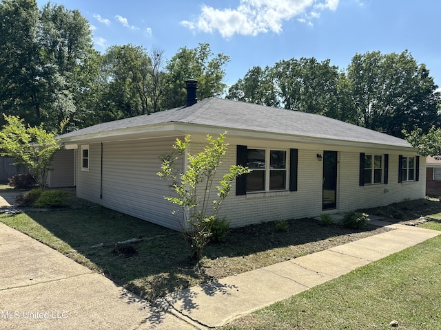 2389 Napoleon Ave, Pearl, MS 39208 - ranch-style house featuring a front lawn