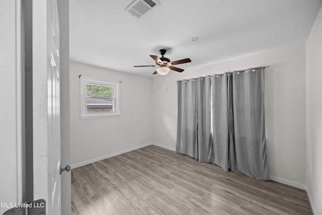 2389 Napoleon Ave, Pearl, MS 39208 - spare room with baseboards, a ceiling fan, visible vents, and light wood-style flooring
