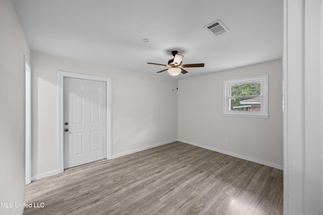 2389 Napoleon Ave, Pearl, MS 39208 - empty room featuring wood finished floors, visible vents, baseboards, and ceiling fan