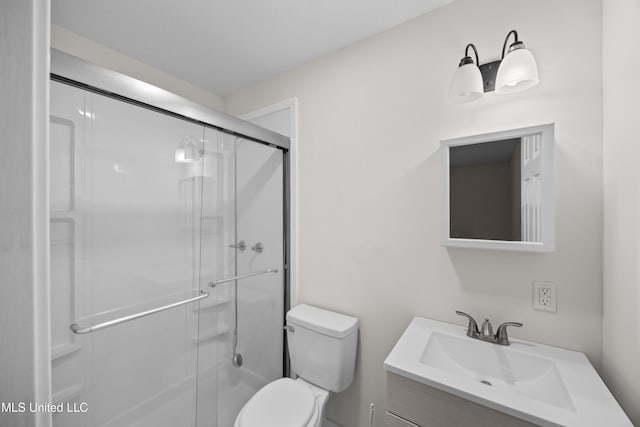 2389 Napoleon Ave, Pearl, MS 39208 - bathroom with vanity, toilet, and a stall shower