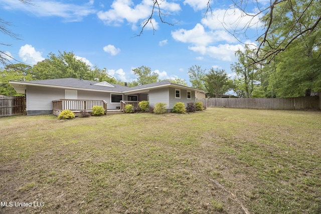 2389 Napoleon Ave, Pearl, MS 39208 - back of house featuring a fenced backyard, a wooden deck, and a yard