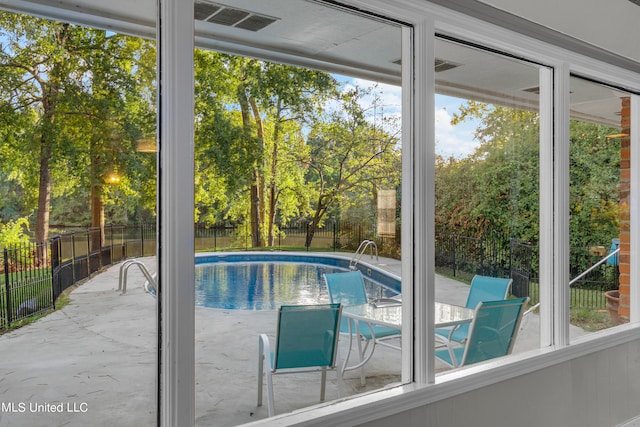 view of pool with a patio area