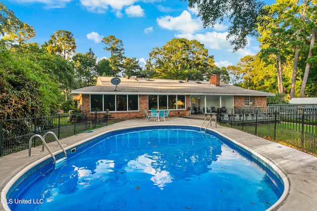 view of pool with a patio area