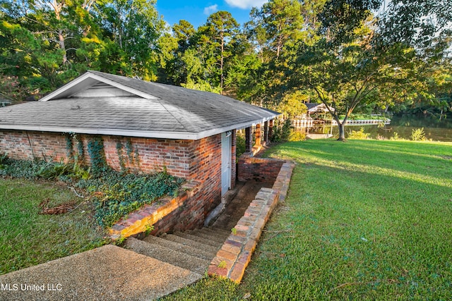 view of yard with a water view