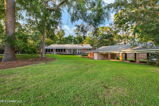 view of front of property with a front lawn