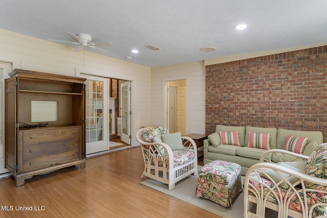 20 Peachtree Ln, Madison, MS 39110 - living area featuring ceiling fan, wood finished floors, recessed lighting, and brick wall