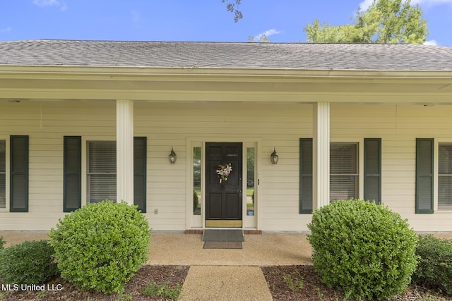 20 Peachtree Ln, Madison, MS 39110 - doorway to property with covered porch and a shingled roof