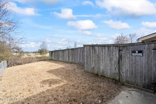 view of yard with fence