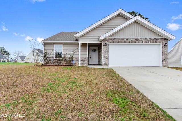 view of front facade featuring a garage and a front lawn