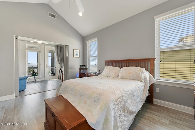 7101 Belle Fontaine Dr, Ocean Springs, MS 39564 - bedroom featuring wood finished floors, high vaulted ceiling, access to exterior, and a ceiling fan