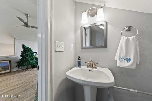7101 Belle Fontaine Dr, Ocean Springs, MS 39564 - bathroom featuring ceiling fan, wood finished floors, and vaulted ceiling