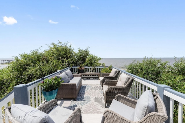 7101 Belle Fontaine Dr, Ocean Springs, MS 39564 - wooden deck featuring an outdoor living space and a water view