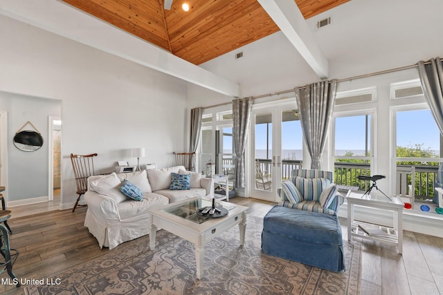 7101 Belle Fontaine Dr, Ocean Springs, MS 39564 - living area with a towering ceiling, healthy amount of natural light, hardwood / wood-style flooring, and wood ceiling