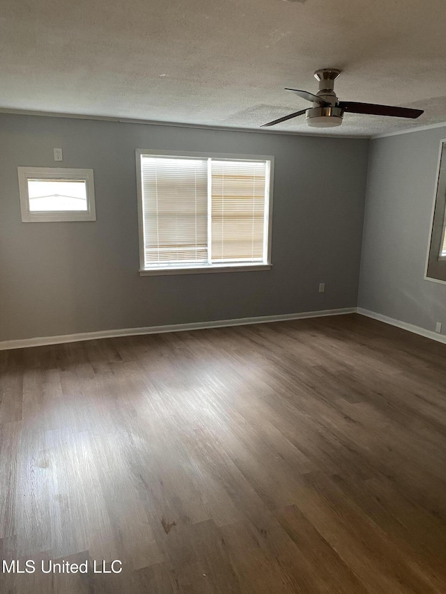 102 Brooklyn Dr, Natchez, MS 39120 - spare room with wood finished floors, ceiling fan, and a textured ceiling