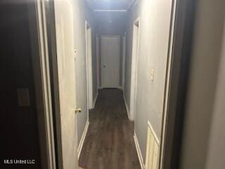 hallway with dark hardwood / wood-style flooring