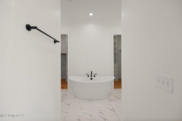 125 Water St, Madison, MS 39110 - full bath featuring a soaking tub, marble finish flooring, a walk in closet, and recessed lighting