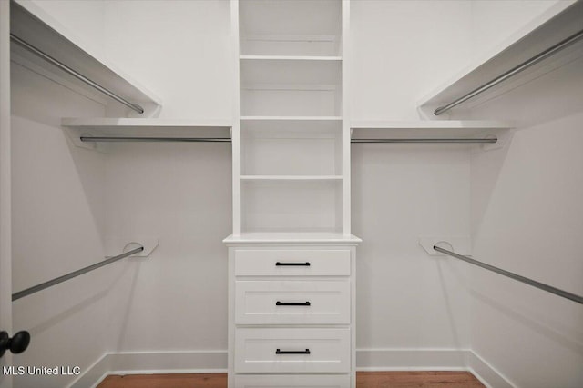 125 Water St, Madison, MS 39110 - spacious closet with wood finished floors