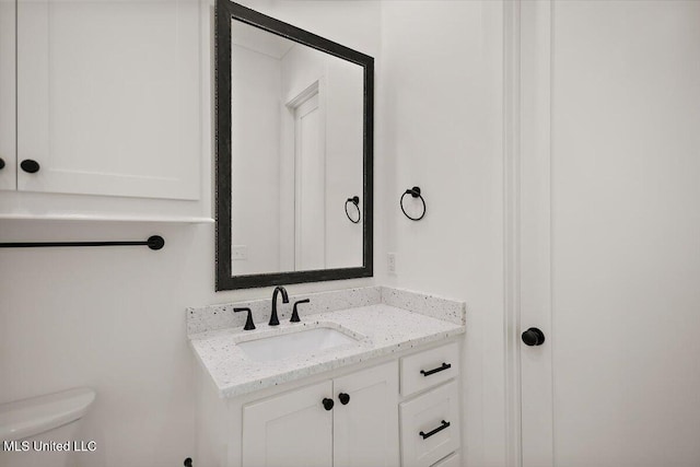 125 Water St, Madison, MS 39110 - bathroom featuring vanity and toilet