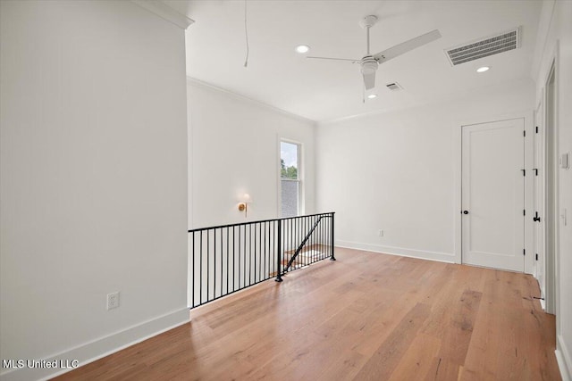 125 Water St, Madison, MS 39110 - spare room featuring ceiling fan, light wood-type flooring, recessed lighting, and crown molding