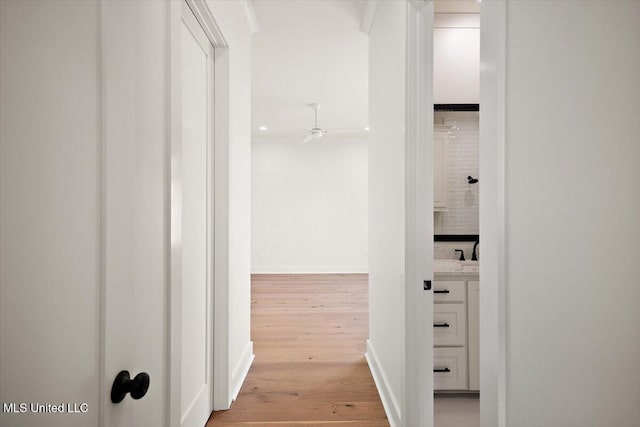 125 Water St, Madison, MS 39110 - corridor featuring light wood-style floors and baseboards