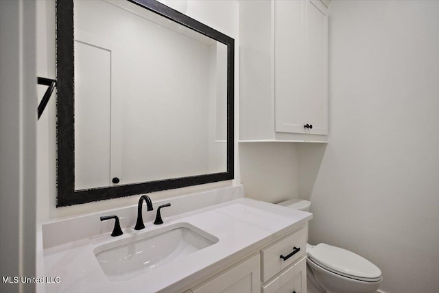 125 Water St, Madison, MS 39110 - bathroom with toilet and vanity