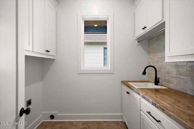 125 Water St, Madison, MS 39110 - laundry area with cabinet space and electric dryer hookup