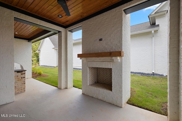 125 Water St, Madison, MS 39110 - view of patio / terrace featuring an outdoor brick fireplace and ceiling fan