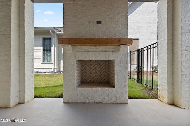 125 Water St, Madison, MS 39110 - view of patio / terrace featuring an outdoor fireplace