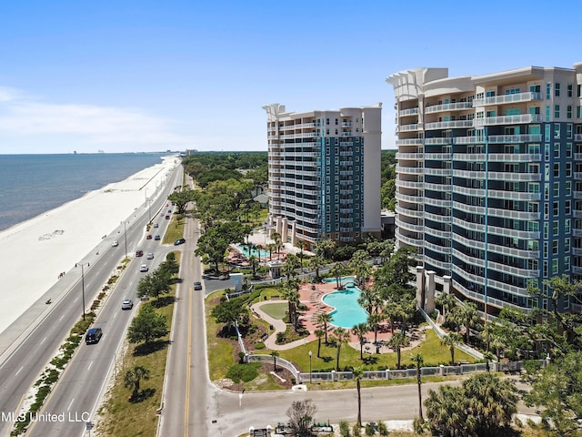 aerial view featuring a water view and a beach view