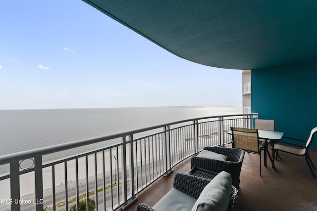 balcony featuring a water view