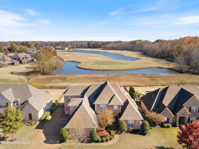 aerial view featuring a water view and a residential view