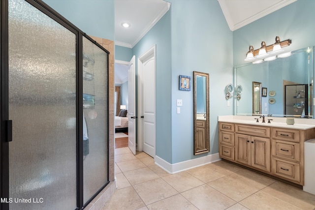 bathroom with a stall shower, baseboards, tile patterned flooring, crown molding, and vanity