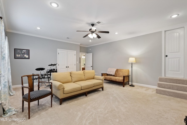 living room featuring recessed lighting, baseboards, ornamental molding, and light colored carpet