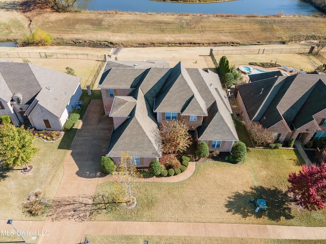 drone / aerial view with a water view